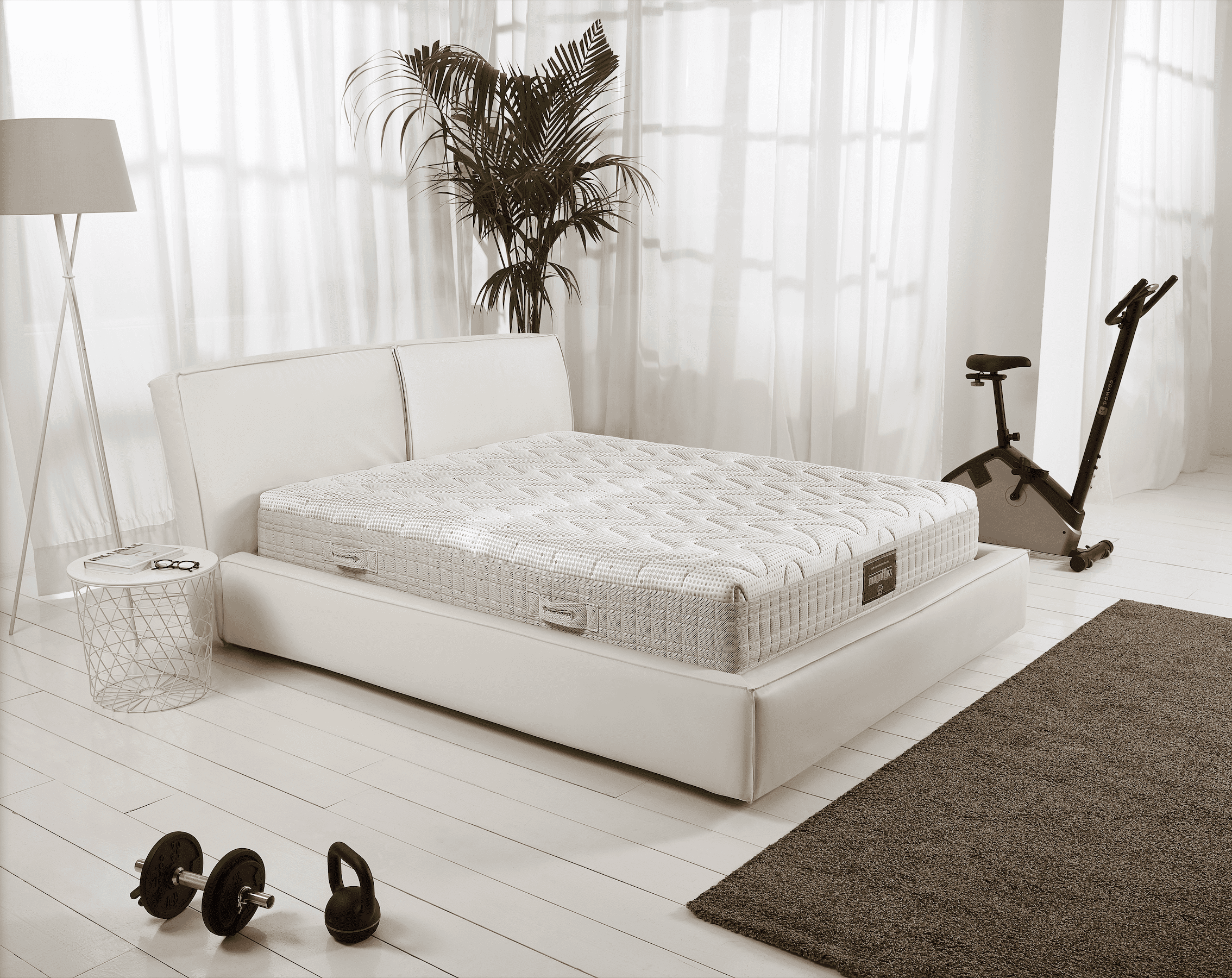 Cosy bedroom with soft textiles and natural tones. Explore stylish bedroom furnishing ideas by Magniflex to elevate your space.