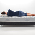 MagniStretch pillow for neck pain supporting the head and neck of a side sleeper.