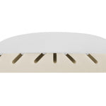 Cross-section of the MagniStretch pillow for neck pain. A white upper layer sits over a beige lower layer cut with angled slots that tilt outward from a vertical slot in the centre.