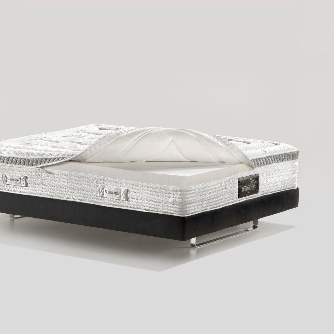 A Magniflex queen-size mattress with an elegant design